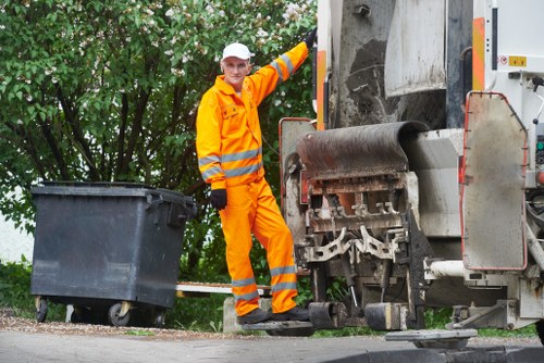 Professional team handling furniture disposal